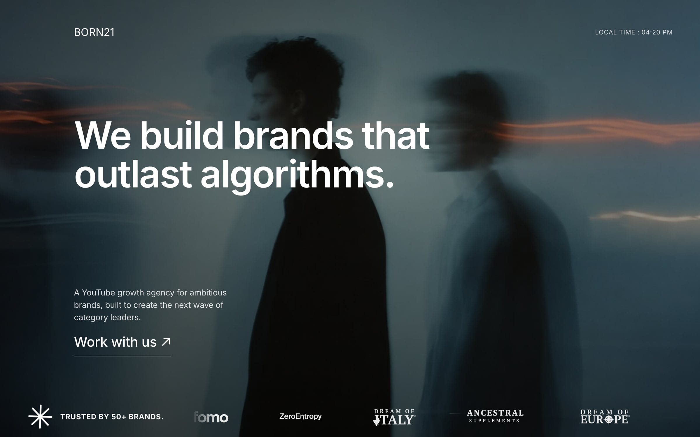 The Born21 homepage: the headline “We build brands that outlast algorithms.” over a dark portrait.
